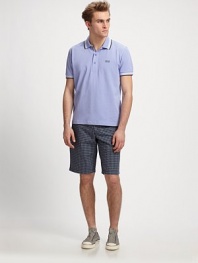 The classic summer polo is updated in cotton jersey with striped tipping along the collar and armholes.Three-button placketCottonMachine washImported