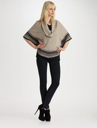 This chunky knit drapes effortlessly over the body in a billowing cowlneck silhouette with open sleeves and Fair Isle trim.Cowlneck Sleeves hit at elbows Tapered back Pullover style About 22 from shoulder to hem 23% nylon/33% viscose/18% cotton/18% wool/4% angora/4% cashmere Dry clean Imported
