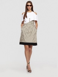 This unique striped style comes with a silk-lined capelet.Removable capelet with jewel neckline, shoulder cutouts, and slit backDecorative buttonsCriss-cross strapsContrast hemlineConcealed back zipFully linedAbout 23½ from natural waistCapelet: 75% cotton/25% silkDress: viscoseDry cleanMade in Italy of imported fabricModel shown is 5'11 (180cm) wearing US size 4. 