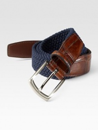 EXCLUSIVELY OURS. Superior stretch and casual comfort in a woven elastic style with alligator-embossed leather trim. Satin nickel buckle About 1¼ wide Made in USA