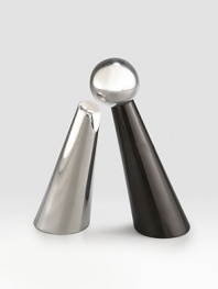 Elegantly evoking the southwest's rugged natural elements, the gleaming metal saltshaker leans into its black granite peppermill cousin. Tarnish-resistant metal Hand wash Salt shaker: 6½H X 2¾ diam. Peppermill: 7H X 2¾ diam. Imported 