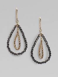14K gold and oxidized sterling silver beading in a concentric hoop design.14K gold Oxidized sterling silver Length, about 1½ French earwires Made in USA 