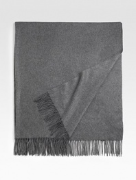 Pure cashmere is the essence of luxury, now styled in a double-ply design for added cozy comfort on a sofa, patio or in a guest room. Fringed edges 56 X 72 Dry clean Imported