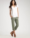 The uber-stylish, shabby-chic trend revealed on these worn-in, cotton khakis with distressing details and rolled up hem. Button and zipper closure Side slash pockets Back welt pockets Belt loops Rise, about 9 Inseam, about 26 (unrolled) Cotton lining Supima cotton/cotton; machine wash Imported