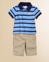 The adorably preppy set pairs a classic striped cotton mesh polo with a belted chino pant for a collegiate-inspired ensemble. Shirt Twill pointed collarShort sleeves with ribbed armbandsFront buttonsEven-vented hem Pants Front buttonFaux flyElastic waistband with belt loops and grosgrain beltAngled front pocketsButtoned-flap back patch pocketsCottonMachine washImported Please note: Number of buttons may vary depending on size ordered.