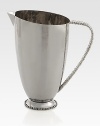 Plated stainless steel, polished to a high shine and accented with signature Molten edging along the handle.From the Molten CollectionStainless steel, nickelplateCapacity, 60 oz. 9.5HHand washImported