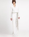 Look simply chic in this floor-sweeping minimalist jumpsuit, with a braided belt for a casual-cool effect. Shirt collarDropped shouldersLong sleeves with button cuffsButton-down front with hidden placketShirred bodiceBanded waist with belt loops and removable braided beltFront slash pocketsInseam, about 39Rise, about 11ViscoseDry cleanImportedModel shown is 5'10.5 (179cm) wearing US size 4.