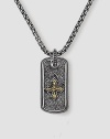 Handsomely textured sterling silver is offset with an 18k solid gold cross. Includes 26 silver chain ½W X 1H Made in USA