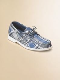 A preppy variation on the boat shoe theme in a fresh plaid fabric with leather lining and trim.Fabric upperLeather lacing at collar and across frontLeather liningPadded insoleEVA soleNike Air technologyImported