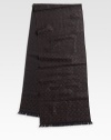 The signature gancini design adds a luxurious trademark to this fine wool scarf. 74 X 14 Wool Dry clean Made in Italy 