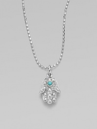 The open hand, a traditional symbol of protection, set with pavé diamonds and a vibrant turquoise center on a 14k white gold ball chain.Diamonds, 0.06 tcw 14k yellow gold Chain length, about 16 Pendant length, about ½ Lobster clasp Imported
