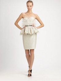 Dramatic and sculptural, rendered in a cotton/silk blend and accented with a feathered, ruffled peplum.Strapless sweetheart necklineLace trimAttached feathersSlender bow beltRuffled peplumBack ventConcealed back zipSilk liningAbout 23 from natural waist73% cotton/27% silkDry cleanMade in USA of imported fabricModel shown is 5'11 (180cm) wearing US size 4. 