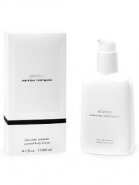 EXCLUSIVELY AT SAKS. A white fluid and light texture that instantly penetrates the skin, leaving it soft, supple, visibly moisturized and delicately scented. 6.7 oz. 