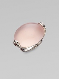 An elegant design with large rose quartz stone accented on the side with pink tourmaline, all set in sterling silver.Rose quartz, pink tourmalineSterling silverWidth, about 1Imported