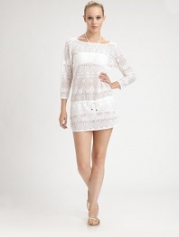 This lacy layer doubles as a beach coverup and as a tunic over a camisole or tank for a feminine look.Wide rounded necklineThree-quarter sleevesDrawstring waistContour side hem78% polyester/22% spandexHand washImported