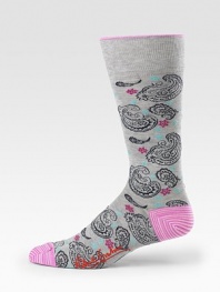 Elegant, finely woven dress socks with a paisley pattern and bright color at the toe and heel. Mid-calf height 80% cotton/19% nylon/1% Lycra Machine wash Imported 