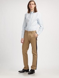 Simple yet smart classic button-down with contrasting button detail is sure to be a coveted wardrobe staple.ButtonfrontButtoned-down collarCottonMachine washImported