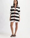 Bold black and white stripes with a contrasting red zipper make this coverup a must-have this season.Stand collarThree-quarter sleevesFront zipperSlash pocketsCottonMachine washMade in USA of Italian fabric