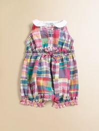 An adorable sleeveless romper is rendered in lovely, vibrant cotton madras.Peter Pan collarSleevelessFront button placketElastic waistband with ruffle trim and bowBottom snapsRuffled, elastic leg bandsCottonMachine washImported Please note: number of buttons and snaps may vary depending on size ordered. 
