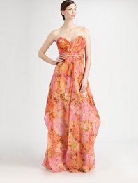 The ultimate feminine statement dress, rendered in airy silk organza printed with a vibrant, painterly floral pattern.Strapless sweetheart necklineAllover pleated bodiceBack drapeConcealed back zipFully linedAbout 49 from natural waistSilkDry cleanImportedModel shown is 5'11 (180cm) wearing US size 4. 