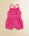 A warm-weather-ready romper crafted from soft terry cloth features jersey-knit ruffles along the neck, a smocked waistline and petite patch pockets embroidered with a signature pony.Square neck with double-tiered ruffle trimCrisscross shoulder strapsHidden bottom snaps for easy on and offPatch pockets with ruffle trimSmocked waistlineElastic hem49% cotton/33% modal/18% polyesterMachine washImported