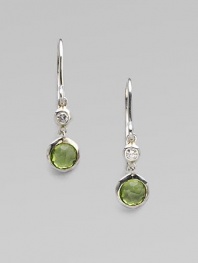 From the Silver Rain Collection. A lovely peridot, richly faceted in a modern sterling silver setting, is capped by one shimmering diamond.Diamonds, .07 tcw PeridotSterling silverDrop, about 1Ear wireImported