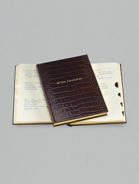 A writing journal for the wine lover, this rich crocodile-embossed Italian calfskin design has 224 lined pages with thumb tabs for France, Italy, USA, Germany, Australia and more. Gilt-edged, acid-free paper Double-faced, satin ribbon marker Smyth-sewn for strength and openability 7 X 9¼ Made in USA