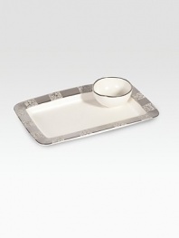 A beautiful hummus set is defined by a marbleized platinum pattern inspired by the sunbaked shores of the Amalfi coast. Set includes a platinum-rimmed porcelain bowl and accompanying tray. Arrives in a signature gift box Porcelain Platinum Tray, 12½W X 8½L Food safe Dishwasher safe Made in USA 