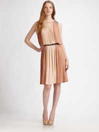 A romantic, lightweight dress with delicately woven pleats in soft, neutral tones. JewelneckSolid inserts on shouldersWide shoulder strapsAllover narrow color-blocked pleatsElastic waist with solid bandAbout 23 from natural waistPolyesterDry cleanImportedModel shown is 5'10 (177cm) wearing US size 4.