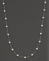 Beaded 14 Kt. white gold necklace with fresh water pearl stations.