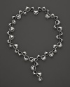 This bold sterling silver necklace, gleaming with black onyx, is a brilliant showcase for Di MODOLO's iconic Triadra design.