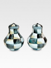 A charming pair that will always have a place at the table, handpainted in a checkerboard juxtaposition of ivory and onyx with bronzed stainless steel trim. Enameled steel Each, 3H X 2½ diam. Hand wash Imported 