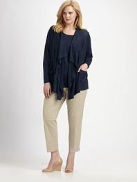 A spectacular waterfall of ruffles creates a flattering, feminine silhouette. Convenient patch pockets add a casual vibe. Open-front designLong sleevesPatch pocketsAbout 28 from shoulder to hem60% linen/35% viscose/5% polyamideHand washImported of Italian fabric