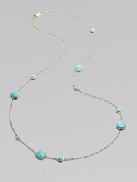 From the Lollipop Collection. Multi-sized, turquoise cabochons, elegantly placed on either side of a radiant, 18k gold chain. Turquoise 18k gold Length around neck, about 37 Diameter, about ¼ - ½ Lobster clasp ImportedPlease note: Due to the characteristics of natural stone, color and pattern may vary slightly. 