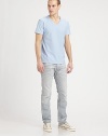 Slim-fitting silhouette, in a uniquely distressed, light-wash for a completed casual feel.Five-pocket styleInseam, about 33CottonMachine washImported