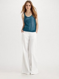 Low-key sheer linen in a simple style for warm days.Scoop neckline Ribbed trim Linen/spandex Dry clean Imported