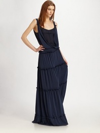 Soft, layered jersey in this season's must-have maxi silhouette, finished with tiered ruffles at the skirt.ScoopneckGathered shoulder strapsCrossover overlayWide waistbandTiered skirtAbout 64¼ from natural waistPolyesterDry cleanImported