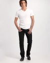 A slim silhouette with modern proportions lends contemporary polish to a classic v-neck. V-neck Ribbed cotton Machine wash Imported 