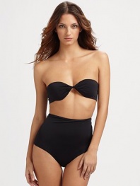 Sexy bandeau top is paired with versatile bikini bottoms that can be folded down, scrunched or high-waisted, providing desired coverage for a superior fit. Twisted bandeau top with light paddingTie backOptional spaghetti strapsDual seam bottoms for versatilityFully lined86% polyamide/14% elastaneHand washImported