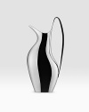 Crafted of highly polished stainless steel, this sleek style is an interpretation of one of the most iconic Georg Jensen silver holloware pitchers designed by Henning Koppel in the late 1940s. 13 H Imported