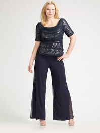Sheer, mesh overlay keeps with the fluid, flowing effect of this silky elegance. Elastic waistband Inseam, about 32½ Full lining Nylon/spandex; dry clean Imported