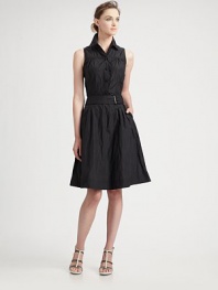 This sleeveless, full-skirted silhouette features trench-inspired tailoring.Shirt collarGathers at yokeButton frontSelf beltFull skirt with side slashesAbout 24 from natural waist52% cotton/43% polyamide/5% metallicDry cleanMade in Italy of imported fabricModel shown is 5'10 (177cm) wearing US size 4. 