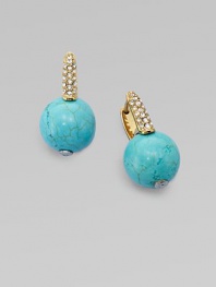 Smooth balls of bold turquoise accented with rhinestone encrusted hinged posts. TurquoiseGlass stonesGoldtone steelLength, about ¾Hinge-and-post backImported 