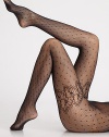 Intricate fine net tights with subtle dots and elegant ornamental tendrils of leaves at the thigh. Soft, smooth waistbandFlat toe seam80% polyamide/20% elastaneHand washMade in Austria
