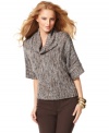 INC weaves in metallic shine to a slouchy-chic cowlneck sweater. Perfect for a relaxed evening out!