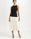 This on-trend tea-length silhouette is prettily pleated, for a feminine, wear-with-all feel.Self waistbandConcealed side zipAllover pleatsSilk liningAbout 28 from natural waist57% acetate/43% viscoseDry cleanImported of Italian fabricModel shown is 5'10 (177cm) wearing US size 4. 