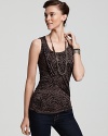 Artful draping elevates this Velvet by Graham & Spencer lizard-print tank to new sartorial heights.