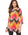 Bright zigzag stripes make a bold spring statement on this Alfani tunic -- perfect over the season's skinny jeans & leggings!