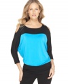 Cable & Gauge take a colorblocked tunic to the next level with sexy shoulder cutouts!