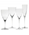 A delicate, lace-inspired pattern etched in crystal and a slim, graceful stem give this wine glass an air of understated elegance. Coordinates with Vera Lace dinnerware and flatware.
